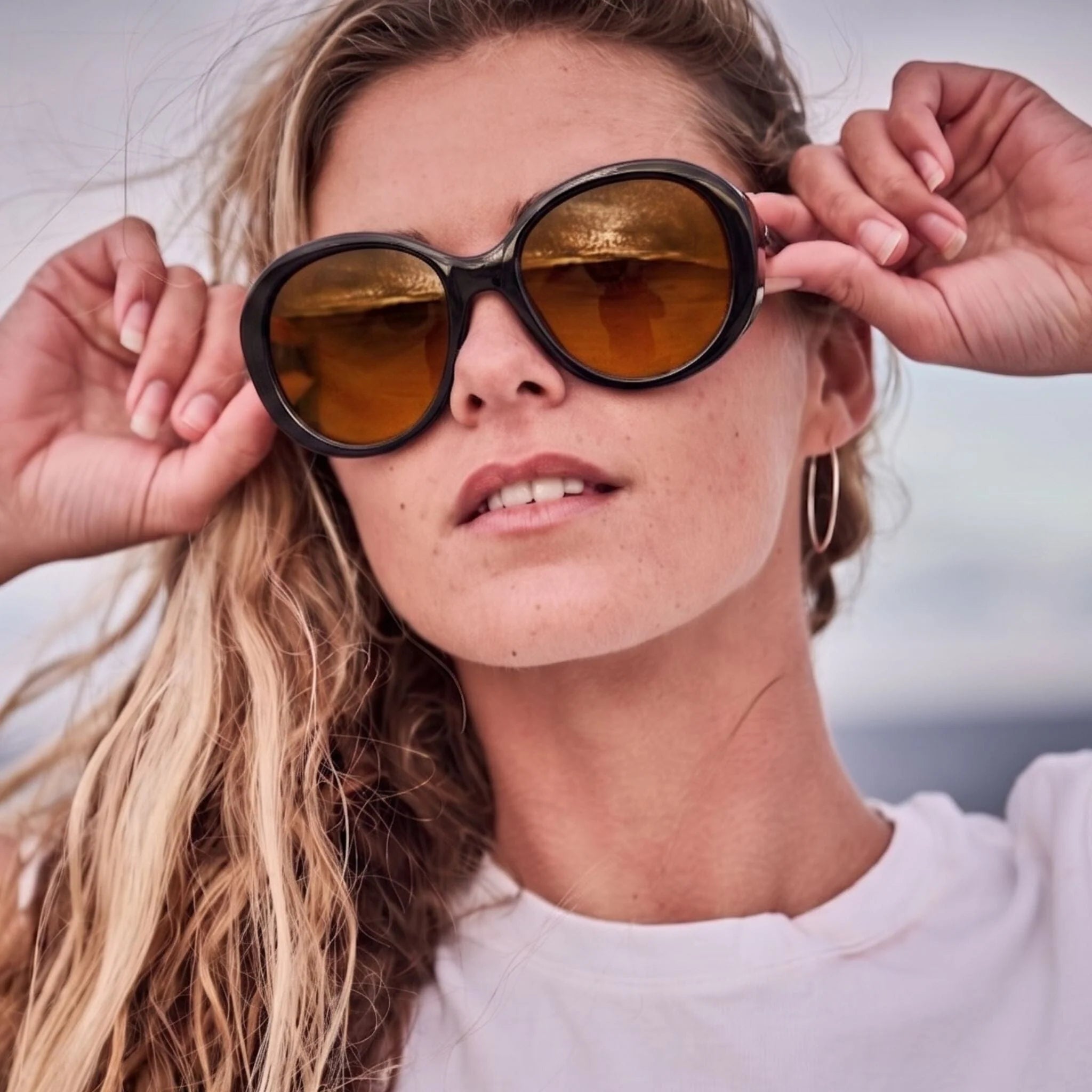 Drummer 2.0 sunglasses in Gloss Black with amber bio lenses by Childe