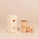 Natural face zinc product with packaging on a beige background